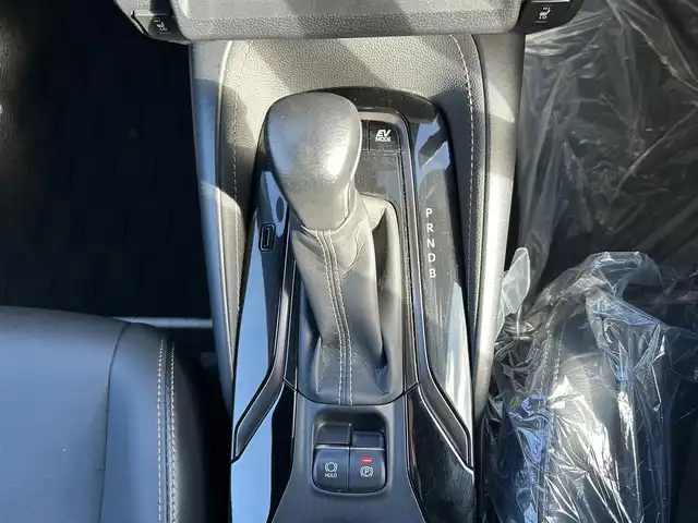 トヨタ カローラツーリング ハイブリッド ダブルバイビー 大阪府 2021(令3)年 4.7万km スパークリングブラックパールクリスタルシャイン トヨタセーフティセンス/・アダプティクブクルーズコントロール/・プリクラッシュセーフティー/・レーントレーシングアシスト/・クリアランスソナー/・オートマチックハイビーム/・ロードサインアシスト/純正9インチナビ/・Bluetooth/CD/DVD/AppleCarPlay/ラジオ/　Miracast/AndroidAuto/主要装備/・バックカメラ/・ブラインドスポットモニター/・ヘッドアップディスプレイ/・オートホールド/・ステアリングヒーター/・ステアリングリモコン/・TOMSエアロ（フロント・サイド・リアアンダー・マフラー有）/・ドライブレコーダー/・ETC2.0