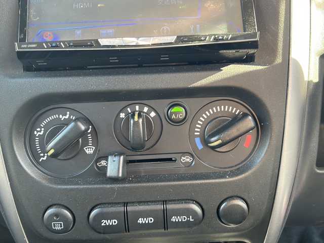スズキ ジムニー XG 佐賀県 2014(平26)年 6.4万km スペリアホワイト 社外ナビ(AVIC-ZH0007)/Bluetooth/CD/DVD/フルセグTV/車高調/バックモニター/4WD/ETC/社外フロアマット/布系シート/ハロゲンヘッドライト/エアコン/社外アルミホイール/リモコンキー/保証書/取扱説明書/点検記録簿(R3/4/6)