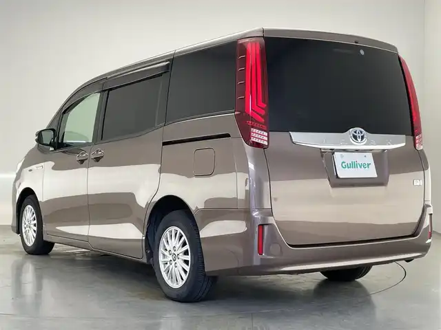 トヨタ ノア ハイブリッド G 愛知県 2015(平27)年 7.9万km ダークシェリーマイカM 純正９型ナビ　純正後席モニター　両側パワスラ　禁煙車　ワイヤレス充電　フルセグＴＶ　バックカメラ　ＥＴＣ　クルコン　シートヒーター　ＬＥＤオートライト　フォグ　ｎａｎｏｅ　プッシュスタート　純正マット