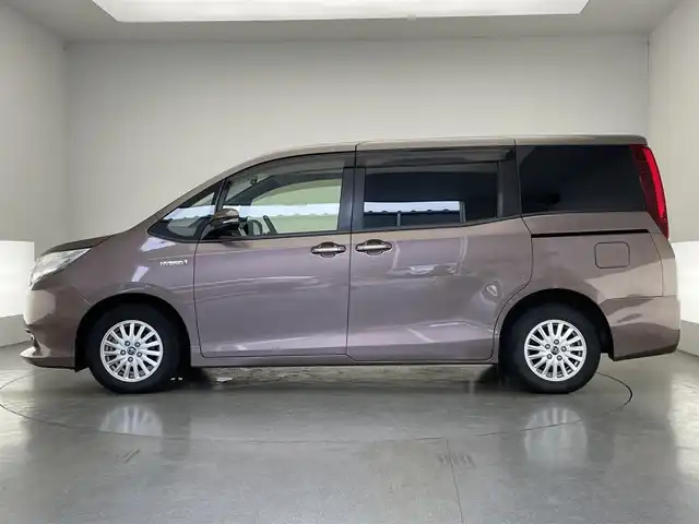 トヨタ ノア ハイブリッド G 愛知県 2015(平27)年 7.9万km ダークシェリーマイカM 純正９型ナビ　純正後席モニター　両側パワスラ　禁煙車　ワイヤレス充電　フルセグＴＶ　バックカメラ　ＥＴＣ　クルコン　シートヒーター　ＬＥＤオートライト　フォグ　ｎａｎｏｅ　プッシュスタート　純正マット