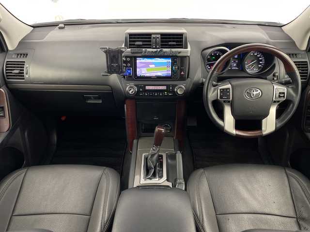 トヨタ ランドクルーザー プラド TX アルジェントクロス 鹿児島県 2014(平26)年 6.8万km ホワイトパールクリスタルシャイン モデリスタエアロ　/社外ナビ　/フルセグTV　/サンルーフ　/フロアマット　/社外レザー風シートカバー　/クルーズコントロール　/ヘッドライトウォッシャー　/シートヒーター　/エンジンスタートボタン　/ＬＥＤヘッドライト/保証書/取扱説明書