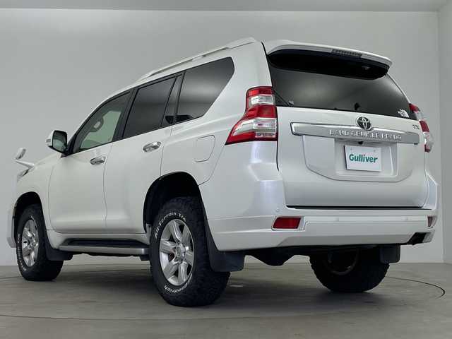 トヨタ ランドクルーザー プラド TX アルジェントクロス 鹿児島県 2014(平26)年 6.8万km ホワイトパールクリスタルシャイン モデリスタエアロ　/社外ナビ　/フルセグTV　/サンルーフ　/フロアマット　/社外レザー風シートカバー　/クルーズコントロール　/ヘッドライトウォッシャー　/シートヒーター　/エンジンスタートボタン　/ＬＥＤヘッドライト/保証書/取扱説明書