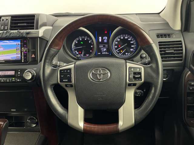 トヨタ ランドクルーザー プラド TX アルジェントクロス 鹿児島県 2014(平26)年 6.8万km ホワイトパールクリスタルシャイン モデリスタエアロ　/社外ナビ　/フルセグTV　/サンルーフ　/フロアマット　/社外レザー風シートカバー　/クルーズコントロール　/ヘッドライトウォッシャー　/シートヒーター　/エンジンスタートボタン　/ＬＥＤヘッドライト/保証書/取扱説明書