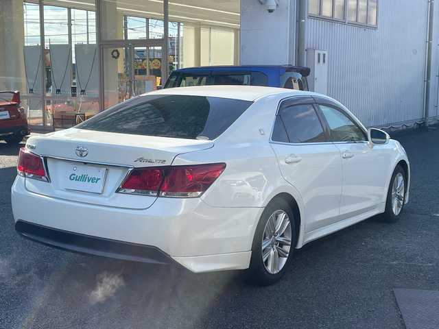 トヨタ クラウン アスリート アスリート 静岡県 2015(平27)年 1.4万km ホワイトパールクリスタルシャイン ワンオーナー/純正ナビ（TV.BT.AM.FM）/純正LEDヘッドライト/純正アルミホイール18インチ/純正フロアマット/純正バイザー/クルーズコントロール追従なし/衝突軽減システム/エンジンプッシュスタート/ETC/スマートキー