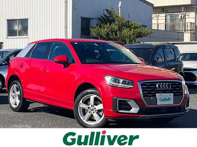 アウディ Ｑ２ 1．0 TFSI スポーツ 東京都 2017(平29)年 5.7万km ブリリアントレッド ワンオーナー/ETC/フルセグTV/バーチャルコックピット/純正メモリナビ/Bluetooth/バックカメラ/電動リアゲート/衝突被害軽減システム/横滑り防止装置/盗難防止装置/コーナーセンサー：前後/レーンキープアシスト/シートヒーター/純正フロアマット/アルミホイール17インチ/冷房：AAC/USB入力端子/スマートキー×2