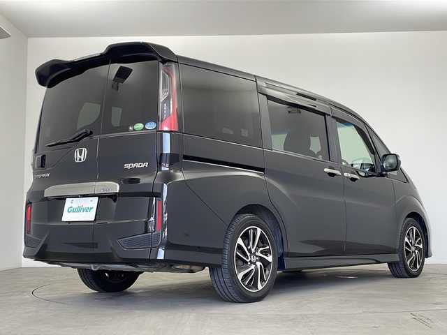 ホンダ ステップワゴン スパーダ クルスピセンシング 鹿児島県 2016(平28)年 5.4万km プレミアムスパークルブラックパール 純正ナビ/　(CD/DVD/USB/HDMI/Bluetooth)/フルセグTV/マルチビューカメラ/純正フリップダウンモニター/純正ドライブレコーダー/ステアリングスイッチ/パドルシフト/アダプティブクルーズコントロール/ホンダセンシング/　・衝突軽減ブレーキ/　・路外逸脱抑制システム/　・標識認識機能/アイドリングストップ/プッシュエンジンスタート/スマートキー×2/両側パワースライドドア/ハーフレザー調シート/前席シートヒーター/リア席サイドサンシェード/純正フロアマット/わくわくゲート/ドアバイザー/LEDヘッドライト/フォグランプ/オートライト/ウィンカー付き電動格納ミラー/取扱説明書/ナビ取扱説明書