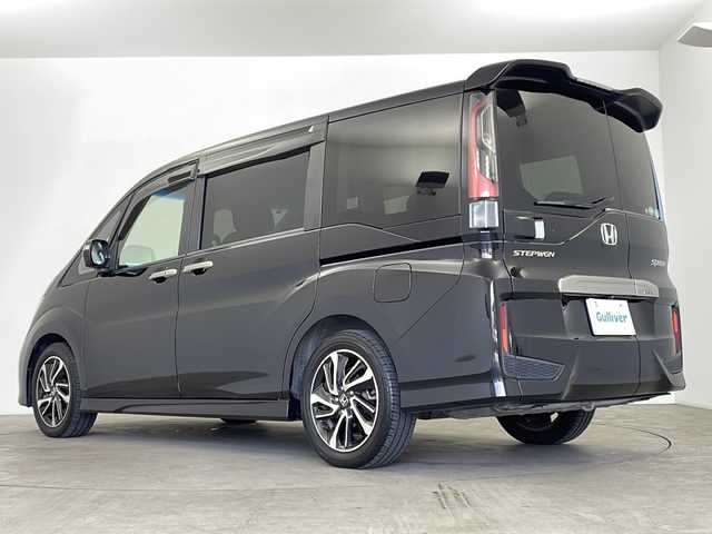 ホンダ ステップワゴン スパーダ クルスピセンシング 鹿児島県 2016(平28)年 5.4万km プレミアムスパークルブラックパール 純正ナビ/　(CD/DVD/USB/HDMI/Bluetooth)/フルセグTV/マルチビューカメラ/純正フリップダウンモニター/純正ドライブレコーダー/ステアリングスイッチ/パドルシフト/アダプティブクルーズコントロール/ホンダセンシング/　・衝突軽減ブレーキ/　・路外逸脱抑制システム/　・標識認識機能/アイドリングストップ/プッシュエンジンスタート/スマートキー×2/両側パワースライドドア/ハーフレザー調シート/前席シートヒーター/リア席サイドサンシェード/純正フロアマット/わくわくゲート/ドアバイザー/LEDヘッドライト/フォグランプ/オートライト/ウィンカー付き電動格納ミラー/取扱説明書/ナビ取扱説明書