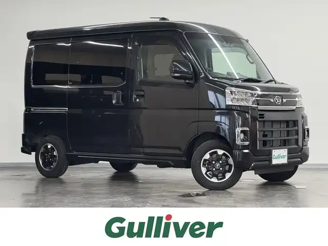 ダイハツ アトレー バン RS 三重県 2022(令4)年 1.8万km ブラックマイカメタリック ガソリン・ターボ/FR/インパネCVT/純正 9インチディスプレイオーディオ/（FM/AM/TV/Bluetooth/USB/iPod/HDMI/AndroidAuto/AppleCarPlay/ドラレコ）/バックカメラ/両側パワースライドドア（タッチ＆ゴーロック機能付）/ドライブレコーダー 前後/ビルトインETC/スマートアシスト/・衝突回避支援ブレーキ機能（対車両・対歩行者（昼夜））/・ブレーキ制御付誤発進抑制機能（前方・後方）/・衝突警報機能（対車両・対歩行者（昼夜））/・車線逸脱抑制制御・車線逸脱警報・路側逸脱警報・ふらつき警報/・全車速追従機能付ACC（アダプティブクルーズコントロール）/・LKC（レーンキープコントロール）/・コーナーセンサー（フロント2個／リヤ4個）/・標識認識機能（進入禁止／最高速度／一時停止）/装備/【OP】視界補助パック（＆バックカメラ）/●スマートインナーミラー/【OP】LEDパック/●LEDヘッドランプ＆フォグランプ、ルームランプ、荷室灯/●アダプティブドライビングビーム/●サイドビューランプ/・革調シートカバー/・オートエアコン/・オートライト/・ステアリングスイッチ/・純正12inAW/・スマートキーx2/など
