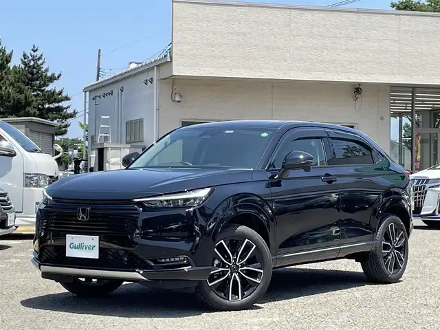 ホンダ ヴェゼル ハイブリッド e:HEV Z 宮城県 2024(令6)年 0.7万km クリスタルブラックパール /純正９インチメモリナビ//フルセグテレビ/CarPlay/AndroidAuto/BT//バックカメラ//前席シートヒーター/ステアリングヒーター//ハンズフリーアクセスパワーテールゲート(予約クローズ機能付)//ワイヤレス充電//ビルトインETC2.0//ホンダセンシング//レーダークルーズコントロール//レーンキープアシスト//ブラインドスポットモニター//LEDヘッドライト/オートハイビーム//社外ドライブレコーダー前後//スマートキーx2