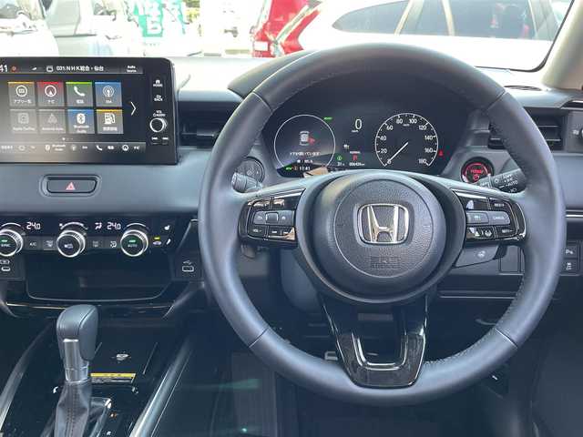 ホンダ ヴェゼル ハイブリッド e:HEV Z 宮城県 2024(令6)年 0.7万km クリスタルブラックパール /純正９インチメモリナビ//フルセグテレビ/CarPlay/AndroidAuto/BT//バックカメラ//前席シートヒーター/ステアリングヒーター//ハンズフリーアクセスパワーテールゲート(予約クローズ機能付)//ワイヤレス充電//ビルトインETC2.0//ホンダセンシング//レーダークルーズコントロール//レーンキープアシスト//ブラインドスポットモニター//LEDヘッドライト/オートハイビーム//社外ドライブレコーダー前後//スマートキーx2