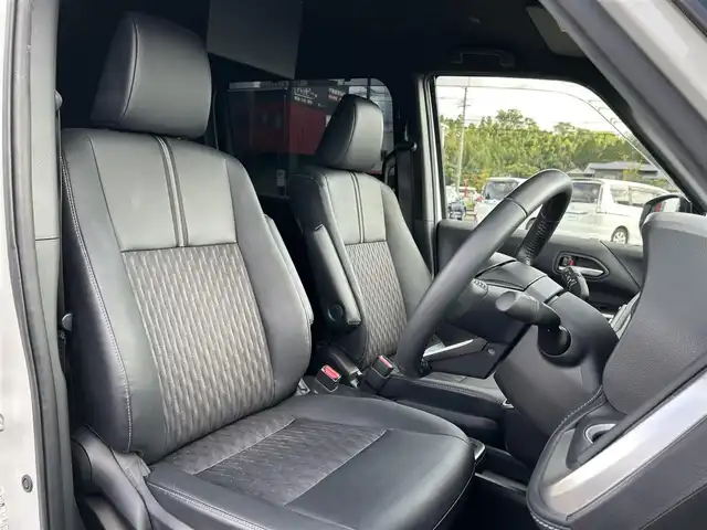 トヨタ ノア ハイブリッド S－Z 鹿児島県 2022(令4)年 2.5万km ホワイトパールクリスタルシャイン フリップダウンモニター/純正ナビ/　　DVD/BT/フルセグ/バックカメラ/両側パワースライドドア/クルーズコントロール/LEDオートライト/シートヒーター/純正17インチアルミホイール/リアオートエアコン/スマートキー/ETC2.0