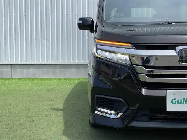 ホンダ ステップワゴン スパーダ ハイブリッド G EX ホンダセンシング 香川県 2018(平30)年 9.7万km プレミアムスパークルブラックパール 登録時走行距離：96394km/純正10型ナビ/　CD DVD BT　フルセグTV/純正11.6型フリップダウンモニター/全方位カメラ/両側パワースライドドア/ホンダセンシング/レーダークルーズコントロール/レーンキープアシスト/LEDヘッドライト/オートライト/フォグランプ/横滑り防止装置/ビルトインETC/ハーフレザーシート/シートヒーター/革巻きステアリング/ステアリングスイッチ/プッシュスタート/スマートキー/スペアキー