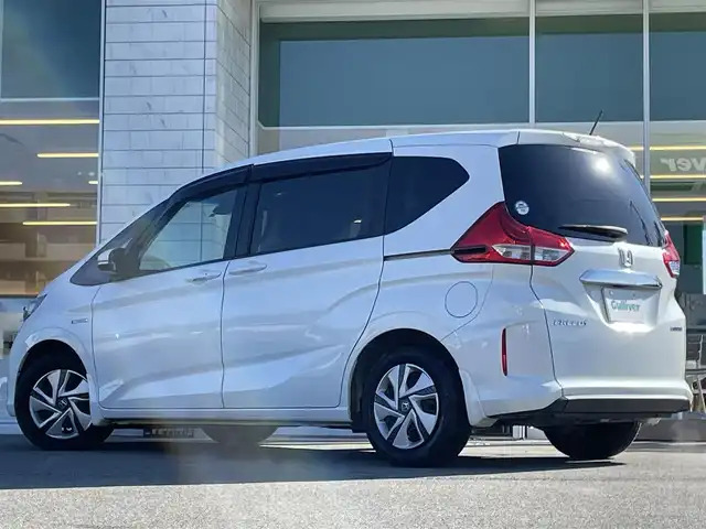 ホンダ フリード＋ ハイブリット G ホンダセンシング 兵庫県 2017(平29)年 7.8万km ホワイトオーキッドパール 7インチナビ/Bluetooth/ビルトインETC/両側パワースライド/レーンキープアシスト/バックカメラ/車線逸脱警報/クルーズコントロール/衝突軽減ブレーキ/LEDヘッドライト/スマートキー/アクセサリーソケット/オートライト