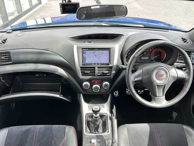 スバル インプレッサ ＷＲＸ STi 山形県 2010(平22)年 9.5万km WRブルーマイカ ４WD/社外メモリナビ/（Bluetooth/DVD/CD/フルセグ）/バックカメラ/前後ドライブレコーダー/ハーフレザー/D席パワーシート/プッシュスタート/スマートキー/ドアバイザー/フォグランプ/純正フロアマット/格納ウィンカーミラー/ETC/横滑り防止装置/社外マフラー（アペックス）/テイン車高調（足回り）