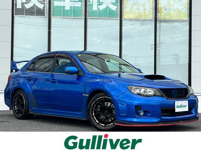 スバル インプレッサ ＷＲＸ STi 山形県 2010(平22)年 9.5万km WRブルーマイカ ４WD/社外メモリナビ/（Bluetooth/DVD/CD/フルセグ）/バックカメラ/前後ドライブレコーダー/ハーフレザー/D席パワーシート/プッシュスタート/スマートキー/ドアバイザー/フォグランプ/純正フロアマット/格納ウィンカーミラー/ETC/横滑り防止装置/社外マフラー（アペックス）/テイン車高調（足回り）