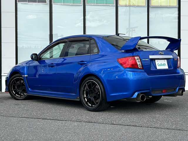 スバル インプレッサ ＷＲＸ STi 山形県 2010(平22)年 9.5万km WRブルーマイカ ４WD/社外メモリナビ/（Bluetooth/DVD/CD/フルセグ）/バックカメラ/前後ドライブレコーダー/ハーフレザー/D席パワーシート/プッシュスタート/スマートキー/ドアバイザー/フォグランプ/純正フロアマット/格納ウィンカーミラー/ETC/横滑り防止装置/社外マフラー（アペックス）/テイン車高調（足回り）