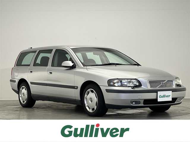 ボルボ Ｖ７０ 滋賀県 2001(平13)年 10.4万km シルバーメタリック 禁煙車/スマートキー/スペアキー/黒革シート/シートヒーター/パワーシート/電動格納ミラー/エアコン/ポータブルナビ/カーオーディオ/純正アルミホイール