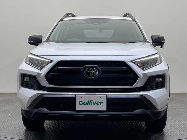 トヨタ ＲＡＶ４ アドベンチャー オフロードPKGⅡ 愛媛県 2024(令6)年 1.6万km スーパーホワイトⅡ 純正10.5インチナビ/Bluetooth/フルセグテレビ/バックカメラ/レーダークルーズコントロール/衝突被害軽減ブレーキ/レーンキープアシスト/前後コーナーセンサー/ブラインドスポットモニター/前後ドライブレコーダー/パワーシート/シートヒーター/シートエアコン/ETC/4WD/ルーフレール/LEDヘッドランプ/オートマチックハイビーム/オートライト/スペアキー/取扱説明書/保証書
