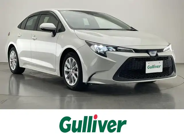 トヨタ カローラ ハイブリット S 愛知県 2021(令3)年 1万km ホワイトパールクリスタルシャイン 純正８型ＤＡナビ　シートヒーター　禁煙　シートヒーター　ハンドルヒーター　電動パーキング　ＢＳＭ　セーフティセンス　衝突軽減　追従クルコン　コーナーセンサー　ＵＳＢ　ＥＴＣ　ＬＥＤライト　スペアタイヤ