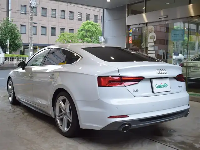 アウディ Ａ５ SB 2．0 TFSI スポーツ 東京都 2017(平29)年 3.3万km グレイシアホワイトメタリック 2000CCターボ/純正ナビゲーション/地上デジタルテレビ/Bカメラ/ETC DSRC/レーダークルーズコントロール/アクティブレーンアシスト/マトリクスLED/前席電動シート・シートヒーター/パワーバックドア/スマートキー/アイドリングストップ/アウディドライブセレクト/点検整備記録簿/・R23456年有/取扱説明書/純正アルミホイール18インチ/純正フロアマット