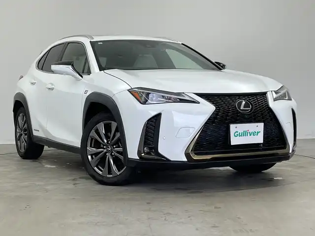 レクサス ＵＸ 250h Fスポーツ 新潟県 2021(令3)年 6.4万km ホワイトノーヴァガラスフレーク サンルーフ/メーカーナビ/(CD.DVD.SD.フルセグ.Bluetooth.Miracast)/パノラミックビューモニター/レクサスセーフティ/レーダークルーズコントロール/レーンキープアシスト/ブラインドスポットモニター/オートマチックハイビーム/革巻きステアリング/ステアリングリモコン/LEDオートライト/フォグランプ/コーナーセンサー/パワーバックドア/前後ドライブレコーダー/前席パワーシート.ヒーター/L_TEXスポーツシート/パドルシフト/ASC/プッシュスタート/スマートキー
