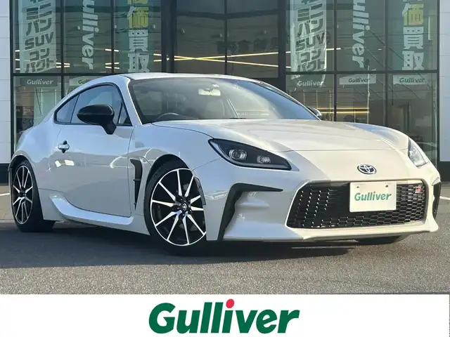 トヨタ ＧＲ８６ SZ 岡山県 2022(令4)年 2.2万km クリスタルホワイトパール 登録時走行距離21199km/TRDエアロスタビライジングカバー/カロッツェリアディスプレイオーディオ/(AM.FM.CD.DVD.BT)/バックカメラ/FUJITSUBOマフラー/車高調/社外トランクスポイラー/社外リアバンパーライト/ETC/前後ドライブレコーダー/横滑り防止装置/クルーズコントロール/オートライト/17インチ純正AW/取説/保証書/スペアキー