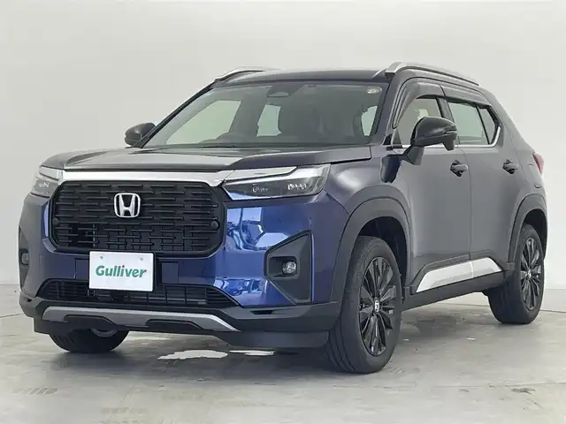 ホンダ ＷＲ－Ｖ Z+ ブラックスタイル 群馬県 2025(令7)年 0.1万km オブシダンブルーパール 特別仕様車　【Z＋BLACK STYLE】/・Z＋専用エクステリア/・BLACK STYLE専用装備/Honda CONNECT for Gathers＋ナビ装着用スペシャルパッケージ/＝＝＝＝/Honda SENSING/・衝突軽減ブレーキ（CMBS）、誤発進抑制機能/後方誤発進抑制機能/近距離衝突軽減ブレーキ/歩行者事故低減ステアリング、路外逸脱抑制機能、アダプティブクルーズコントロール（ACC）、車線維持支援システム（LKAS）、先行車発進お知らせ機能、標識認識機能、オートハイビーム、パーキングセンサーシステム/LEDフォグライト/本革巻ステアリングホイール＋セレクトレバー/リアセンターアームレスト/パーセルカバー/コンビシート/17インチアルミホイール/シャープシルバー塗装ルーフレールガーニッシュ/純正Gathersナビ/バックカメラ/前後ドラレコ/ETC/スマートキー /プッシュスタート/LEDヘッドライト