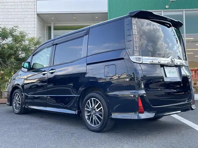 トヨタ ヴォクシー ZS 煌Ⅱ 岡山県 2016(平28)年 4.1万km ブラッキッシュアゲハガラスフレーク 純正10インチナビ　NSZN-Z66T/フルセグTV、CD、DVD、AM、FM、Bluetooth/バックカメラ/ビルトインETC/両側パワースライドドア/トヨタセーフティセンス/・プリクラッシュセーフティ/・レーンディパーチャーアラート/・オートマチックハイビーム/ドライブレコーダー