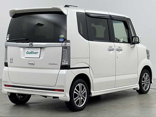 ホンダ Ｎ ＢＯＸ カスタム G Lパッケージ 道央・札幌 2017(平29)年 3.8万km プレミアムホワイトパールⅡ ・４ＷＤ/・社外フローティングナビ＆ＴＶ＆ＢＴ＆ＤＶＤ＆ＣＤ/・バックカメラ/・ＣＴＢＡ/・両側電動スライドドア/・社外レーダー/・社外ドライブレコーダー/・前席シートヒーター/・ステアリングヒーター/・ビルトインＥＴＣ/・ＨＩＤヘッドライト/・フォグランプ/・ベンチシート/・ドアミラーヒーター/・純正１４インチアルミ
