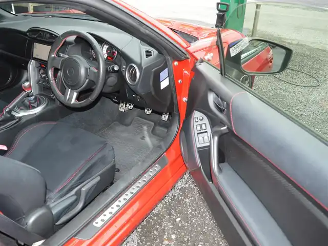 トヨタ ８６ GT 栃木県 2012(平24)年 10.2万km ライトニングレッド 純正SDナビ/[BT/フルセグ/AM/FM/CD/DVD]/バックカメラ/ETC/HIDヘッドライト/フォグランプ/オートライト/プッシュスタート/革巻きステア/純正マット