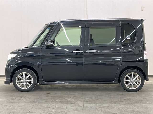 ダイハツ タント カスタム X スペシャル 道央・札幌 2012(平24)年 5.2万km ブラックマイカメタリック ・４WD/・純正SDナビ/CD・DVD・AM・FM・BT/・フルセグTV/・ミュージックサーバー/・片側パワースライドドア/・純正フロアマット/・ベンチシート・ドアバイザー/・電動格納ミラー/・ウインカーミラー/・ワンオーナー/・スマートキー/・取扱説明書