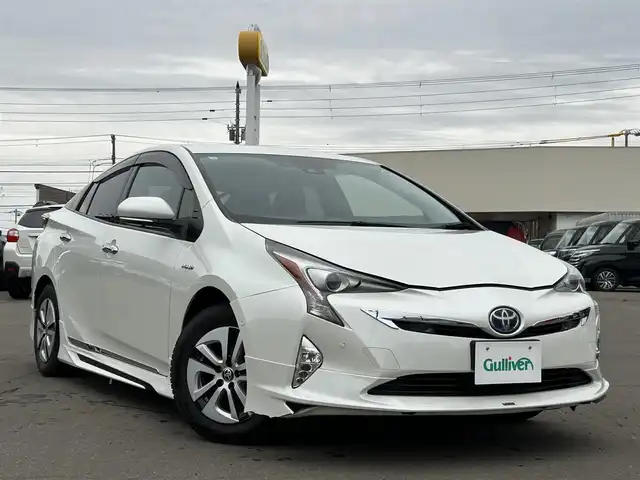 トヨタ プリウス A プレミアム 道東・釧路十勝 2018(平30)年 7.6万km ホワイトパールクリスタルシャイン 4WD/寒冷地仕様車/MODELLISTAエアロ/Toyota Safety SenseP/・PCS(プリクラッシュセーフティシステム)/・LDA(レーンディパーチャーアラート)/・オートマチックハイビーム/・レーダークルーズコントロール/HUD(ヘッドアップディスプレイ)/BSM(ブラインドスポットモニター)/純正ディーラーOPメモリナビ/ (CD/DVD/BT)/フルセグTV/TVキャンセラー/バックカメラ/ETC/純正ドライブレコーダー/革巻きステアリング/ステアリングスイッチ/レザーシート/パワーシート/ (運転席)/シートヒーター/ (運転席/助手席)/プッシュスタート/スマートキー/スペアキー/純正キー1体型エンジンスターター/オートライト/純正LEDヘッドライト/フォグランプ/ (フロント/リア)/ウインカーミラー/電動格納ミラー/ミラーヒーター/横滑り防止装置/アイドリングストップ/ナビ取扱説明書/取扱説明書/保証書