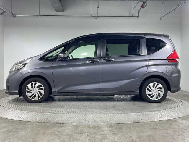 ホンダ フリード G ホンダセンシング 神奈川県 2016(平28)年 5.8万km モダンスティールM 純正7インチナビ/CD&BT&USB&SD&ワンセグTV/バックカメラ/ホンダセンシング/衝突軽減ブレーキ/先行車発進お知らせ/標識認識機能/レーンキープアシストシステム/路外逸脱抑制システム/アタプティブコーナリングライト/レーダークルーズコントロール/両側パワースライドドア/純正ドライブレコーダー前後/ビルトインETC/アイドリングストップ/LEDヘッドライト