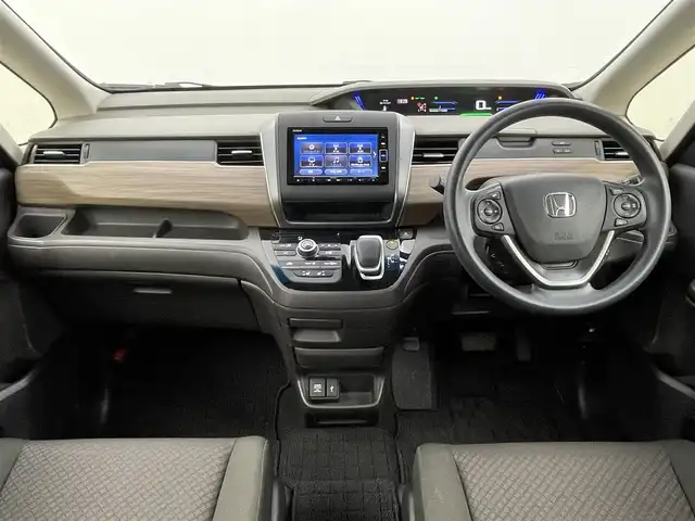 ホンダ フリード ハイブリット G ホンダセンシング 岡山県 2020(令2)年 5.6万km ミッドナイトブルービームM 純正ナビ/【Bluetooth/フルセグTV/CD/DVD/USB接続】/型番:VXM-204VFi/バックカメラ/前席シートヒーター/両側パワースライドドア/ＬＥＤヘッドライト/ビルトインＥＴＣ/衝突軽減ブレーキ/レーダークルーズコントロール/ドアバイザー/純正フロアマット/プッシュスタート/スマートキー×1/取扱説明書/ナビ取扱説明書/新車保証書