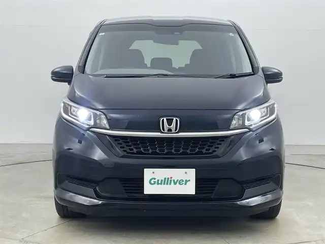 ホンダ フリード ハイブリット G ホンダセンシング 岡山県 2020(令2)年 5.6万km ミッドナイトブルービームM 純正ナビ/【Bluetooth/フルセグTV/CD/DVD/USB接続】/型番:VXM-204VFi/バックカメラ/前席シートヒーター/両側パワースライドドア/ＬＥＤヘッドライト/ビルトインＥＴＣ/衝突軽減ブレーキ/レーダークルーズコントロール/ドアバイザー/純正フロアマット/プッシュスタート/スマートキー×1/取扱説明書/ナビ取扱説明書/新車保証書