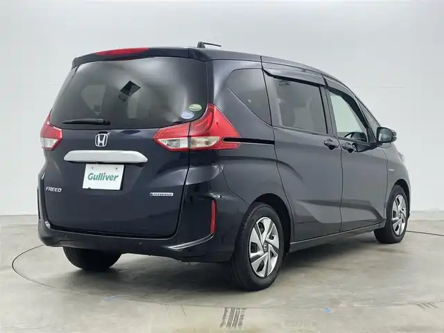 ホンダ フリード ハイブリット G ホンダセンシング 岡山県 2020(令2)年 5.6万km ミッドナイトブルービームM 純正ナビ/【Bluetooth/フルセグTV/CD/DVD/USB接続】/型番:VXM-204VFi/バックカメラ/前席シートヒーター/両側パワースライドドア/ＬＥＤヘッドライト/ビルトインＥＴＣ/衝突軽減ブレーキ/レーダークルーズコントロール/ドアバイザー/純正フロアマット/プッシュスタート/スマートキー×1/取扱説明書/ナビ取扱説明書/新車保証書