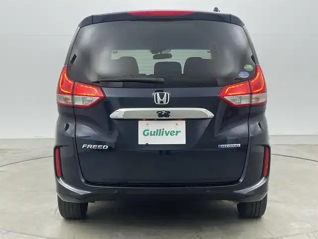 ホンダ フリード ハイブリット G ホンダセンシング 岡山県 2020(令2)年 5.6万km ミッドナイトブルービームM 純正ナビ/【Bluetooth/フルセグTV/CD/DVD/USB接続】/型番:VXM-204VFi/バックカメラ/前席シートヒーター/両側パワースライドドア/ＬＥＤヘッドライト/ビルトインＥＴＣ/衝突軽減ブレーキ/レーダークルーズコントロール/ドアバイザー/純正フロアマット/プッシュスタート/スマートキー×1/取扱説明書/ナビ取扱説明書/新車保証書