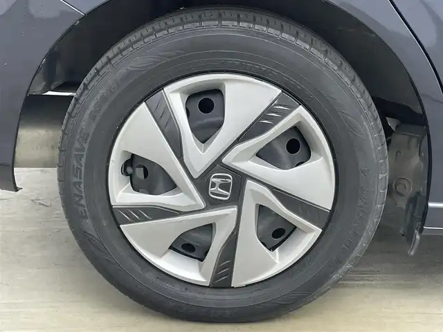 ホンダ フリード ハイブリット G ホンダセンシング 岡山県 2020(令2)年 5.6万km ミッドナイトブルービームM 純正ナビ/【Bluetooth/フルセグTV/CD/DVD/USB接続】/型番:VXM-204VFi/バックカメラ/前席シートヒーター/両側パワースライドドア/ＬＥＤヘッドライト/ビルトインＥＴＣ/衝突軽減ブレーキ/レーダークルーズコントロール/ドアバイザー/純正フロアマット/プッシュスタート/スマートキー×1/取扱説明書/ナビ取扱説明書/新車保証書