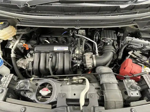 ホンダ フリード ハイブリット G ホンダセンシング 岡山県 2020(令2)年 5.6万km ミッドナイトブルービームM 純正ナビ/【Bluetooth/フルセグTV/CD/DVD/USB接続】/型番:VXM-204VFi/バックカメラ/前席シートヒーター/両側パワースライドドア/ＬＥＤヘッドライト/ビルトインＥＴＣ/衝突軽減ブレーキ/レーダークルーズコントロール/ドアバイザー/純正フロアマット/プッシュスタート/スマートキー×1/取扱説明書/ナビ取扱説明書/新車保証書