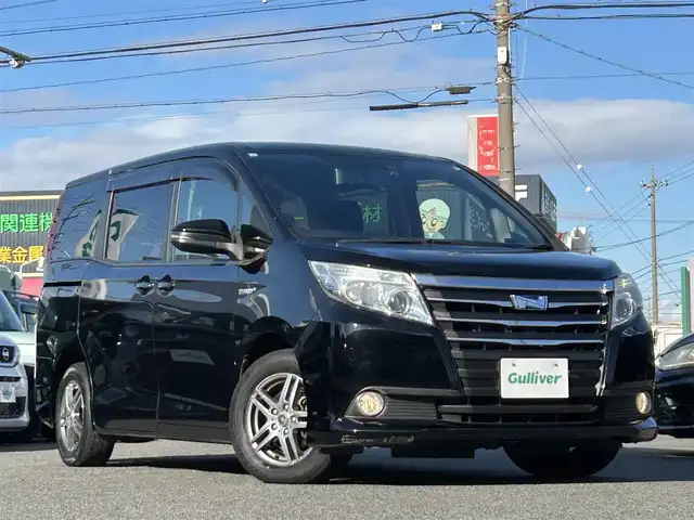 トヨタ ノア ハイブリッド G 愛知県 2015(平27)年 14.2万km ブラック /禁煙//アルパイン12.8インチフリップダウンモニター//アルパイン10インチナビ//CD/DVD/BT/MSV/フルセグ//バックカメラ//レーダー探知機//置くだけ充電//純正ドライブレコーダー//ビルトインETC//両側パワースライドドア//PCS//クルーズコントロール//横滑り防止装置//シートヒーター//LEDオートライト//フォグランプ//オートリトラウィンカーミラー//ロールサンシェード//革巻きステアリング//ステアリングスイッチ//照明付バニティミラー//nanoe//純正フロアマット//純正ドアバイザー//スペアスマートキー//新車時保証書//取扱説明書//サマータイヤ付純正15AW積込