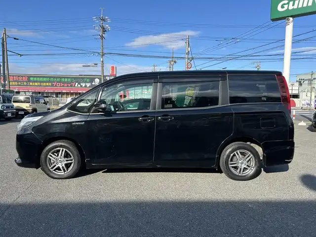 トヨタ ノア ハイブリッド G 愛知県 2015(平27)年 14.2万km ブラック /禁煙//アルパイン12.8インチフリップダウンモニター//アルパイン10インチナビ//CD/DVD/BT/MSV/フルセグ//バックカメラ//レーダー探知機//置くだけ充電//純正ドライブレコーダー//ビルトインETC//両側パワースライドドア//PCS//クルーズコントロール//横滑り防止装置//シートヒーター//LEDオートライト//フォグランプ//オートリトラウィンカーミラー//ロールサンシェード//革巻きステアリング//ステアリングスイッチ//照明付バニティミラー//nanoe//純正フロアマット//純正ドアバイザー//スペアスマートキー//新車時保証書//取扱説明書//サマータイヤ付純正15AW積込