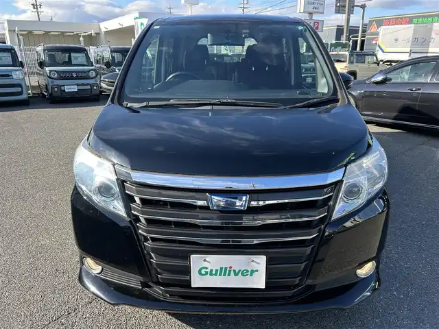 トヨタ ノア ハイブリッド G 愛知県 2015(平27)年 14.2万km ブラック /禁煙//アルパイン12.8インチフリップダウンモニター//アルパイン10インチナビ//CD/DVD/BT/MSV/フルセグ//バックカメラ//レーダー探知機//置くだけ充電//純正ドライブレコーダー//ビルトインETC//両側パワースライドドア//PCS//クルーズコントロール//横滑り防止装置//シートヒーター//LEDオートライト//フォグランプ//オートリトラウィンカーミラー//ロールサンシェード//革巻きステアリング//ステアリングスイッチ//照明付バニティミラー//nanoe//純正フロアマット//純正ドアバイザー//スペアスマートキー//新車時保証書//取扱説明書//サマータイヤ付純正15AW積込