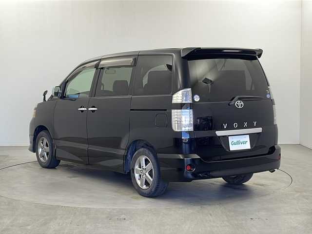 トヨタ ヴォクシー Z 煌 栃木県 2006(平18)年 14.2万km ブラック 純正HDDナビ/バックカメラ/ETC/ステアリングスイッチ/８人乗り/両側パワースライドドア