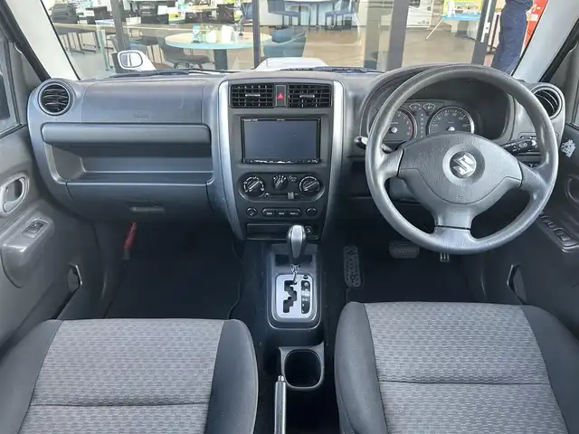 スズキ ジムニー XC 栃木県 2005(平17)年 13.9万km シルキーシルバーメタリック 4WD/社外ナビ/バックカメラ/純正16インチAW/純正フロアマット/背面タイヤ/ルーフバスケット/ETC/フォグランプ