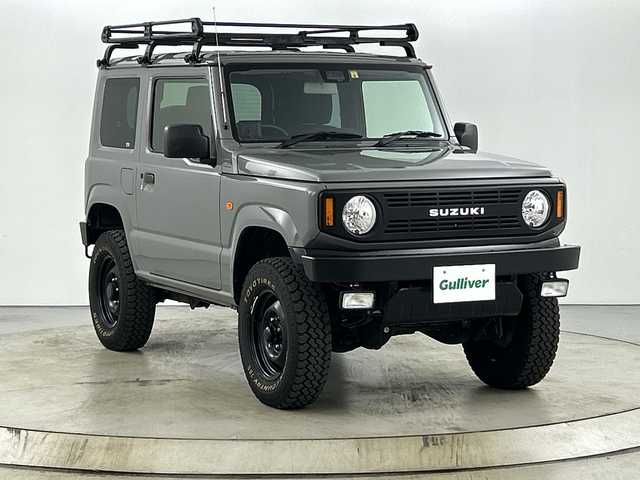 スズキ ジムニー XL 愛知県 2020(令2)年 2.3万km ミディアムグレー 禁煙車/４WD/ターボ/純正８インチナビ/（CD/DVD/Bluetooth/SD)/フロントカメラ/タフレックルーフキャリア/シーエルリンク製２インチリフトアップ/シーエルリンク製フロント・リアバンパー/シーエルリンク製グリル/スロットルコントローラー/スズキセーフティサポート/・衝突軽減ブレーキ/・レーンキープアシスト/・オートマチックハイビーム/ETC/前席シートヒーター/ダウンヒルアシスト/１７インチアルミホイール/スマートキー/スペアキー１本/プッシュスタート/LEDヘッドライト/フロントフォグランプ/オートライト/フロアマット/横滑り防止装置
