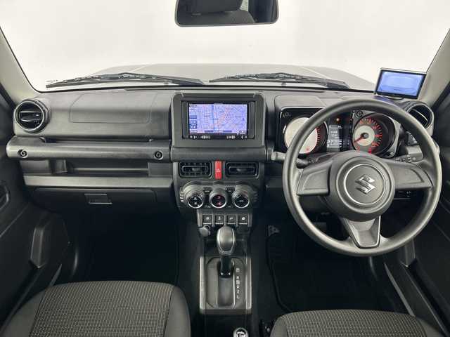 スズキ ジムニー XL 愛知県 2020(令2)年 2.3万km ミディアムグレー 禁煙車/４WD/ターボ/純正８インチナビ/（CD/DVD/Bluetooth/SD)/フロントカメラ/タフレックルーフキャリア/シーエルリンク製２インチリフトアップ/シーエルリンク製フロント・リアバンパー/シーエルリンク製グリル/スロットルコントローラー/スズキセーフティサポート/・衝突軽減ブレーキ/・レーンキープアシスト/・オートマチックハイビーム/ETC/前席シートヒーター/ダウンヒルアシスト/１７インチアルミホイール/スマートキー/スペアキー１本/プッシュスタート/LEDヘッドライト/フロントフォグランプ/オートライト/フロアマット/横滑り防止装置
