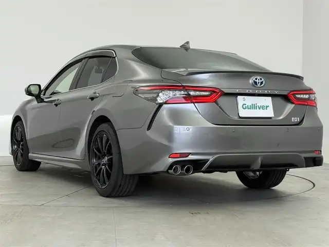 トヨタ カムリ WS 愛知県 2021(令3)年 5.6万km グレー JBLプレミアムサウンドシステム/純正メーカーナビ/AM/FM/BT/フルセグ/トヨタセーフティセンス/プリクラッシュセーフティ/横滑り防止装置/レーダークルーズコントロール/レーンキープアシスト/クリアランスソナー/バックカメラ/ビルトインETC2.0/ECOMODE/NORMALMODE/SPORTMODE/D席パワーシート/ハーフレザーシート/革巻きステアリング/ステアリングリモコン/パドルシフト/電動パーキング/ブレーキホールド/MTモード付AT/プッシュスタート/スマートキー/LEDヘッドライト/オートライト/オートハイビーム/電動格納ミラー/ウィンカーミラー/純正フロアマット