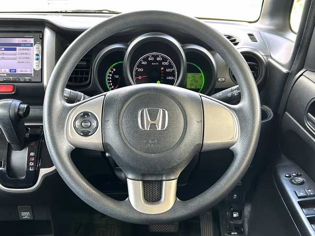 ホンダ Ｎ ＢＯＸ G Lパッケージ 鳥取県 2014(平26)年 17.4万km プレミアムホワイトパール フルタイム4WD/スマートキー/左側パワースライド/純正メモリナビ/バックカメラ/イオンエアコン/保証書・取説
