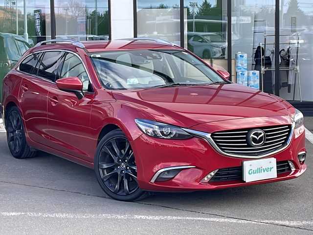 マツダ アテンザ ワゴン XD Lパッケージ 道東・釧路十勝 2015(平27)年 10.6万km ソウルレッドプレミアムメタリック ・４WD/・純正ナビ/（ラジオ・BT・CD・DVD・USB・AUX・フルセグ）/・バックカメラ/・ETC/・アイドリングスストップ/・ヘッドアップディスプレイ/・レーンキープアシスト/・本革ステアリング/・前方ドライブレコーダー/・レーダークルーズコントロール/・コーナーセンサー後方/・BOSEプレミアムサウンド/・レザーシート/・パワーシート/・レーンキープアシスト/・ルーフレール/・横滑り防止装置/・シートヒーター全席/・オートエアコン/・オートライト/・スマートキー/・プッシュスタート/・純正19インチアルミホイール/・純正フロアマット/・LEDヘッドライト/・フロントフォグライト/・リアフォグ/・社外18インチアルミホイール冬タイヤ積込/（2017年製造　3mm山）