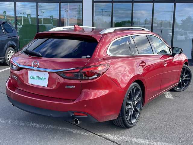 マツダ アテンザ ワゴン XD Lパッケージ 道東・釧路十勝 2015(平27)年 10.6万km ソウルレッドプレミアムメタリック ・４WD/・純正ナビ/（ラジオ・BT・CD・DVD・USB・AUX・フルセグ）/・バックカメラ/・ETC/・アイドリングスストップ/・ヘッドアップディスプレイ/・レーンキープアシスト/・本革ステアリング/・前方ドライブレコーダー/・レーダークルーズコントロール/・コーナーセンサー後方/・BOSEプレミアムサウンド/・レザーシート/・パワーシート/・レーンキープアシスト/・ルーフレール/・横滑り防止装置/・シートヒーター全席/・オートエアコン/・オートライト/・スマートキー/・プッシュスタート/・純正19インチアルミホイール/・純正フロアマット/・LEDヘッドライト/・フロントフォグライト/・リアフォグ/・社外18インチアルミホイール冬タイヤ積込/（2017年製造　3mm山）